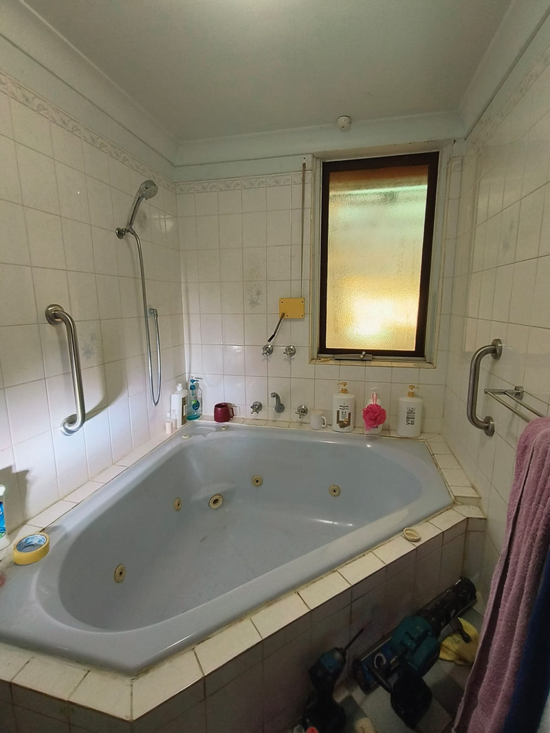 Grab rail installed in a Perth bathroom to improve safety and support at home