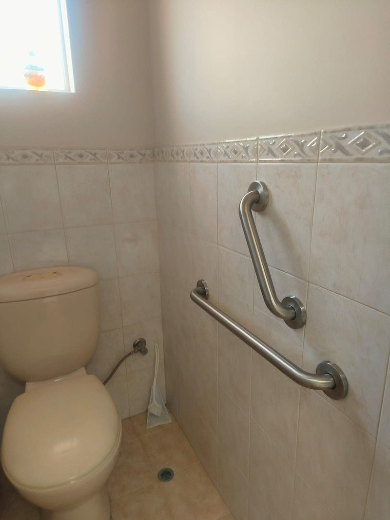 Toilet grab rail installed in a Perth bathroom for safer everyday use