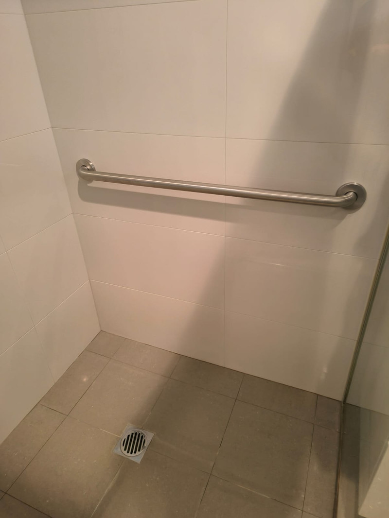 Shower grab rail installed in a Perth home to reduce slip and fall risk