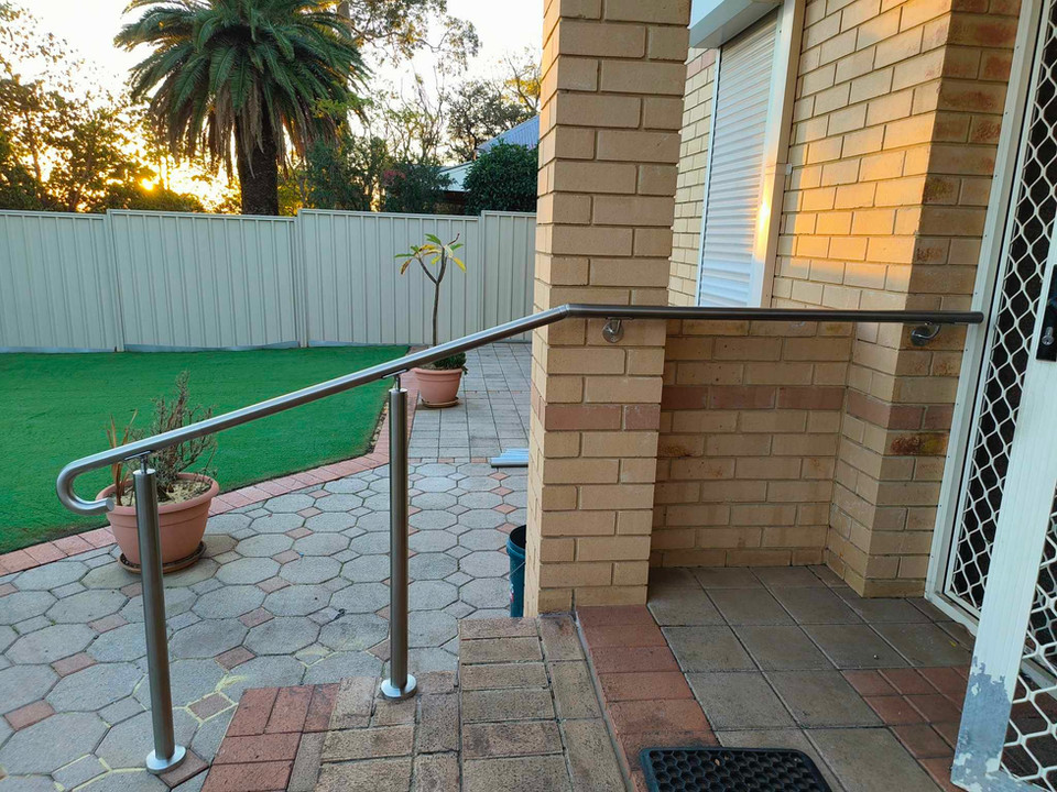 Custom handrail installation at a Perth home entrance